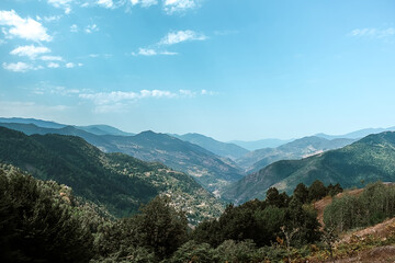 Travel. Girl travels through the mountains glamping, tents,waterfalls of wild nature. Unity, mental health, eco travel. Hiking in the mountains, van life vibes, travelling,good moments, digital detox