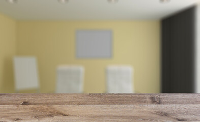 Modern meeting room. 3D rendering.. Mockup.   Empty paintings. Background with empty wooden table. Flooring.