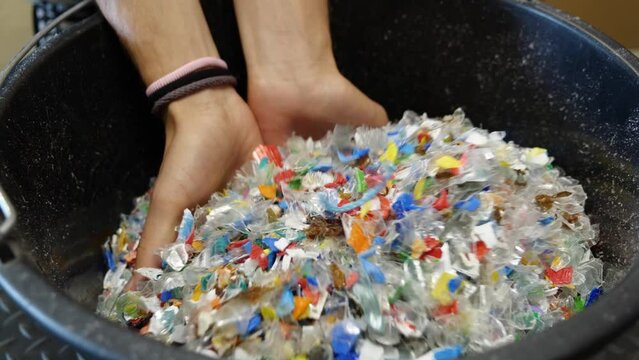 Crushed plastic for recycling or manufacturing. Waste Plastic Bottle Recycling. The plastic factory, manufacture and industry