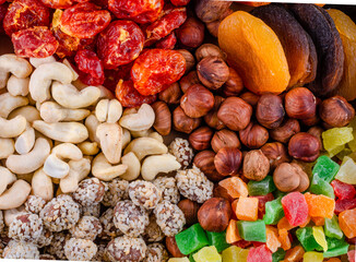 Nuts and candied fruits in the assortment top view.
