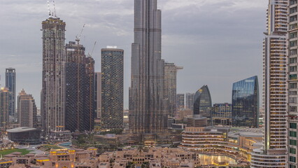 Dubai Downtown day to night transition timelapse with tallest skyscraper and other towers