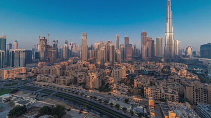 Obraz premium Dubai Downtown morning timelapse with tallest skyscraper and other towers