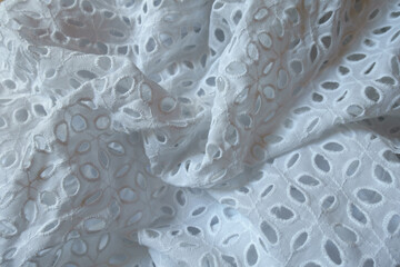 Rippled vintage white eyelet embroidery cotton fabric