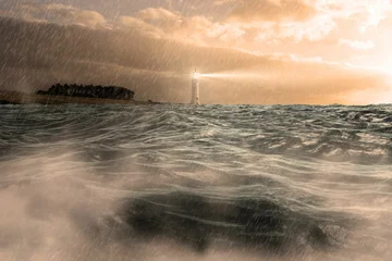 Cercles muraux Phare Stormy sea with lighthouse