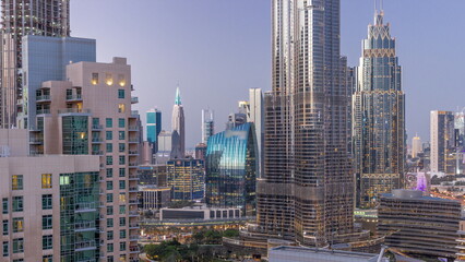 Fototapeta na wymiar Aerial view of Dubai International Financial Centre district skyscrapers day to night timelapse