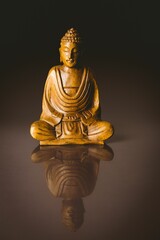 Buddha statue on table