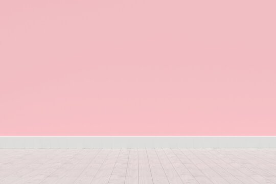 Pink wall by hardwood floor 