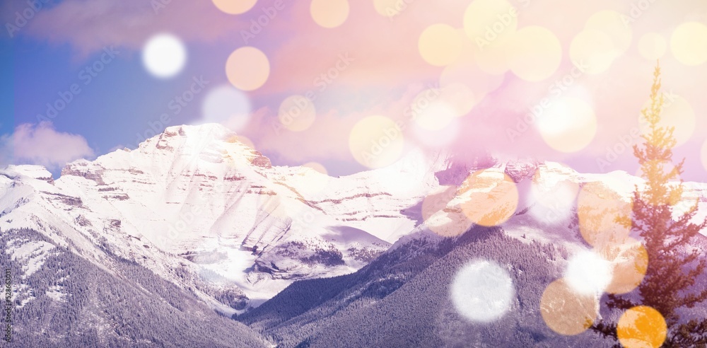 Poster snowcapped mountains with bokeh in foreground