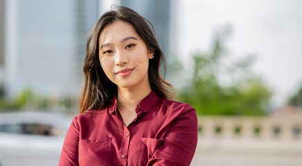 portrait pretty young asian businesswoman, happy leaving work close look with affectionate smile, self-confidence. © PintoArt