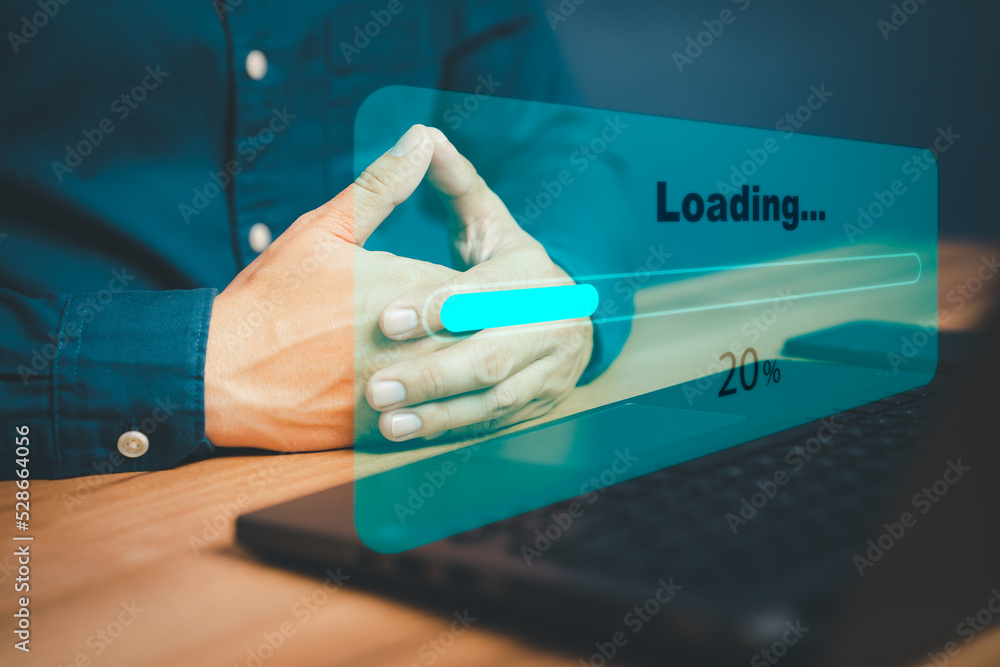 Poster Man using laptop for download software and waiting to loading digital business data form website, concept of waiting for load of loading bar.