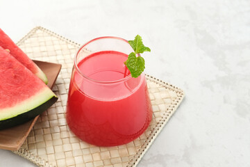 Fresh watermelon juice with mint, cold pressed juice. Healthy drink concept. 
