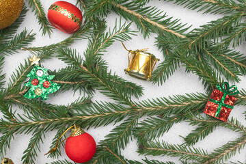 Christmas background made of spruce paws and ornaments