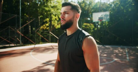 Fit man working out with dumbbells. Gym concept. Healthy lifestyle. dumbbells concentrating working out alone. exercises for the hand muscles. Outdoor training on the field of sports exercises. - Powered by Adobe