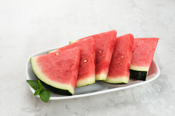 Fresh ripe watermelon slice served on plate. Space for text
