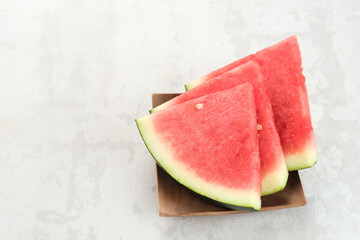 Fresh ripe watermelon slice served on plate. Space for text
