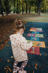 little child is playing on the playground in ruse bulgaria 