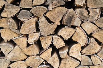 Logs. Firewood. Birch firewood, hardwood. Preparation of firewood for the heating season. Natural fuels, firewood for burning in the stove or fireplace