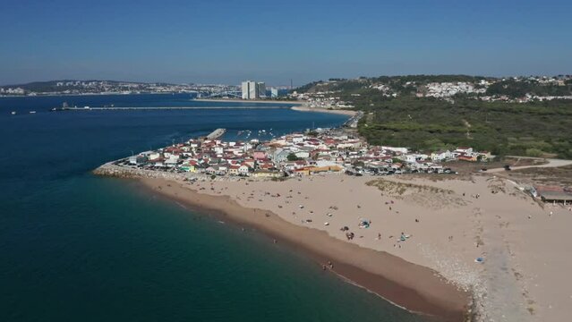 Descending pedestal drone footage of Cova do Vapor village