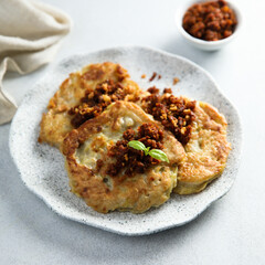 Homemade potato pancakes with red pesto