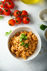 Homemade chicken ragout with pine nuts