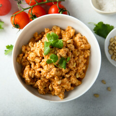 Homemade chicken ragout with pine nuts