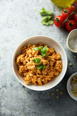 Homemade chicken ragout with pine nuts
