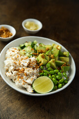 Homemade chicken bowl with avocado