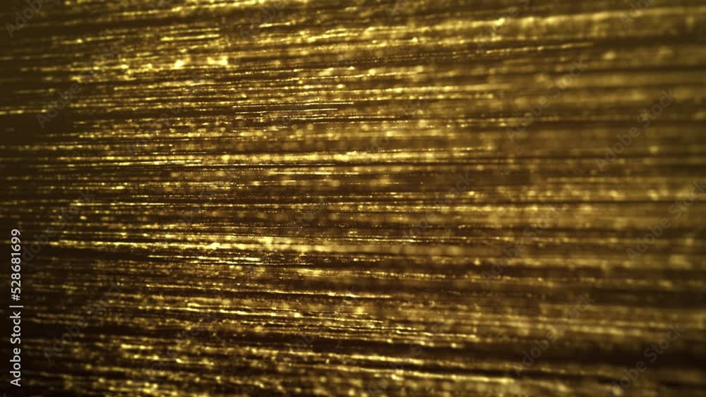 Poster abstract gold filaments bursting background/ 4k animation of an abstract wallpaper background of bur