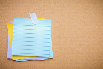 Fototapeta premium abstract paper note pin on cork board. cork board with blank notes. sticker note