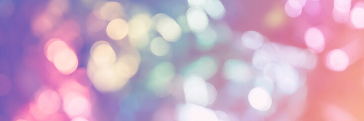 Blurred bokeh background for Christmas and New Year holiday. Abstract pastel pink gradient color...