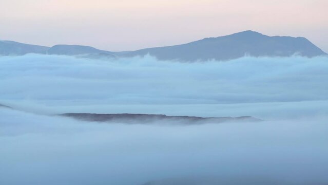Spectacular mountain cloud inversion scene over Snowdonia Wales UK