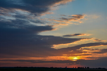 abstract background of cloudy sunset sky golden hour