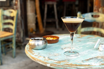 Cocktail with coffee in the martini glass