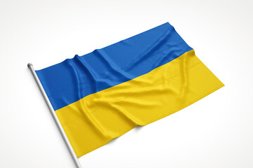 Ukrainian Flag is Laying on a White Surface