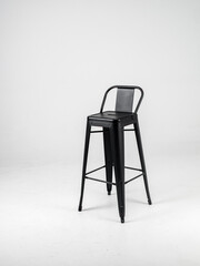 Black bar chairs on white background
