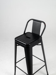 Black bar chairs on white background