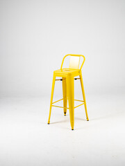 Yellow bar chair on white background