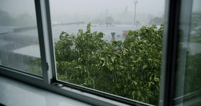 Raining Ice Storm, Torrential Hailstone Rain on Window, Inundation, Flooding, Rainfall, Natural Calamity Disaster Heavy Rainy Day. Torrential Rainstorm With Hail In Urban Residential Street