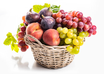 Fruit basket. Grapes, figs and peaches