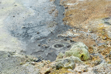 hydrothermal outlet on the shore of the hot lake in the caldera of the Golovnin volcano on the island of Kunashir