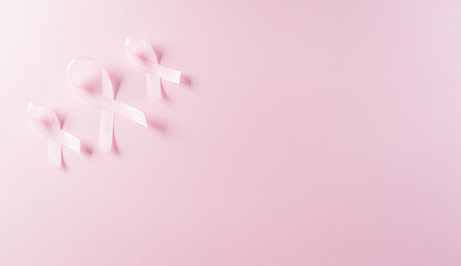 Pink ribbons on pastel background, Symbol of women's breast cancer awareness, Health care and medical concept.