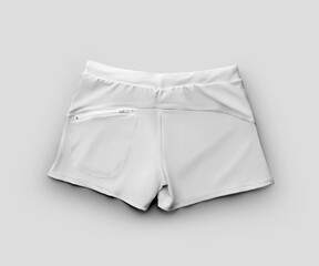 Mockup of white male trunks for swimming with a wide elastic band, back view, boxers close-up with a zippered pocket, subject isolated on background.