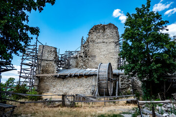 The ruins of Vinne Castle and its surroundings in the Zemplin region of Slovakia during...