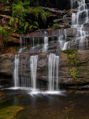 Fototapeta na wymiar Close-up view of waterfall cascade.