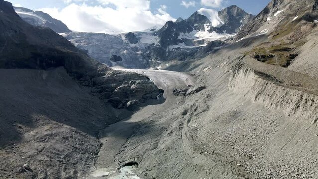 Aerial shot towards the huge glacier in Zinal, Switzerland, getting very close