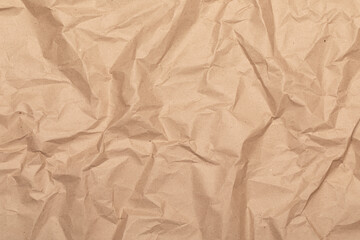 Obraz premium Crumpled kraft paper textured background
