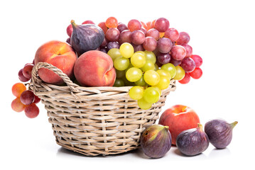 Fruit basket. Grapes, figs and peaches