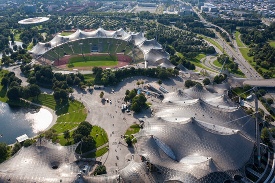Munich, Germany – September 5, 2010: Aerial view of Olympic park at Munich with Stadium and Olympiahalle by architect Frei Otto