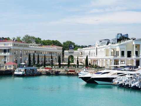 Russia, Sochi 12.06.2022. Complex grand marina in the center. View of the shopping complex Sochi from the sea