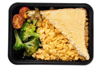 Portion of breakfast with fried eggs and toast